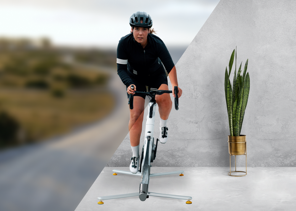 Rider leaning a TiltBike while riding out of the saddle